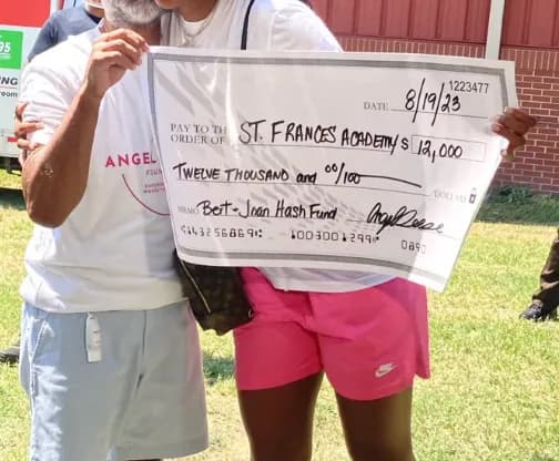 Angel's Care Closet — $12,000 tuition donation to St. Frances Academy